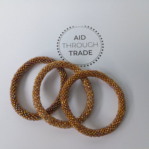 Fair Trade Aid Through Trade - 3 Roll-On Glass Beaded Bracelets - Picture 1 of 1